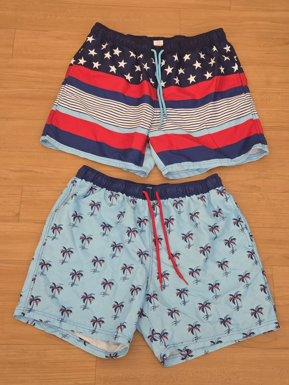 2 Pairs Boys Large Light Blue Palm Print Swim Shorts with Navy & Red Accents